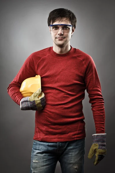 Blue collar worker with hardhat — Stock Photo, Image