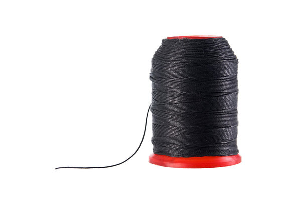 Spool of black thread isolated with clipping path.