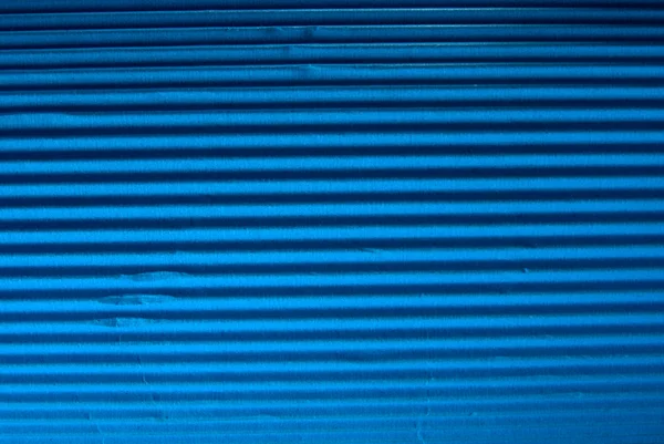 Голубая гофрированная картонная фактура . — стоковое фото