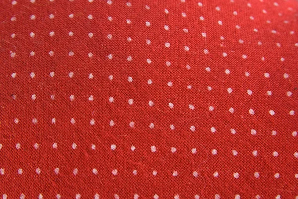 Tecido vermelho vintage com pontos brancos — Fotografia de Stock