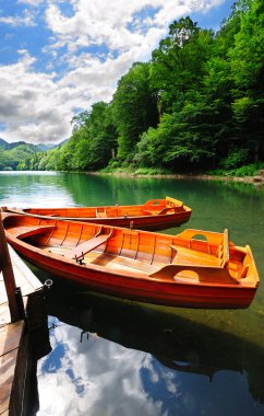 Boats on a lake clipart