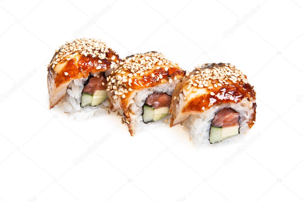 Maki sushi rolls with eel, avocado and cucumber