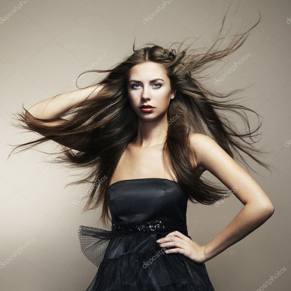 Portrait of young dancing woman with long flowing hair — Stock Photo ...