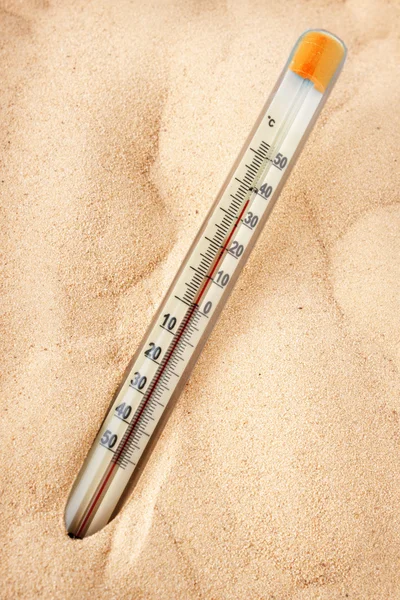 stock image Thermometer shows the heating of the sand