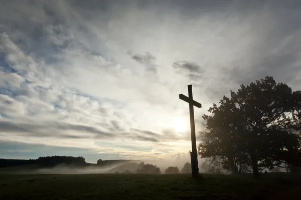 Dramatic sky and a cross — Stock Photo, Image