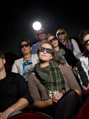 Cinema spectators with 3d glasses clipart