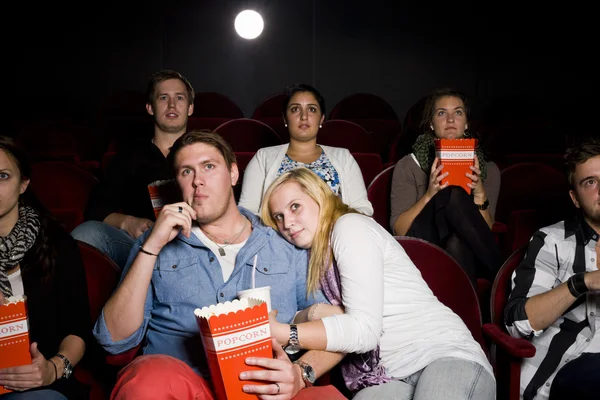Young couple at cinema — Stock Photo, Image