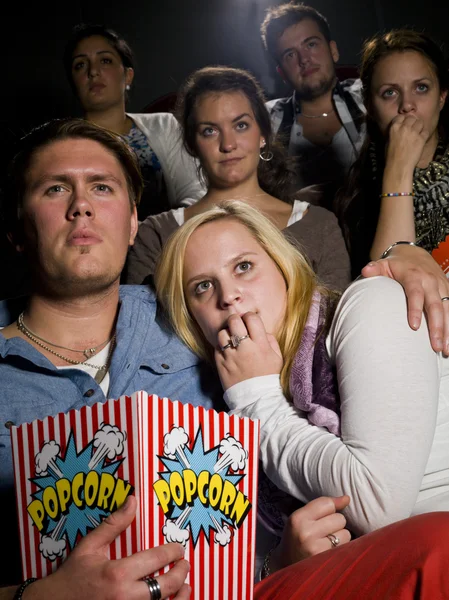 Young couple at the cinema — Stock Photo, Image