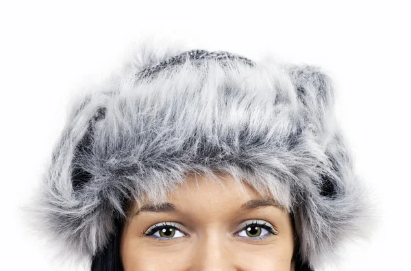 Eyes and furry grey hat — Stock Photo, Image