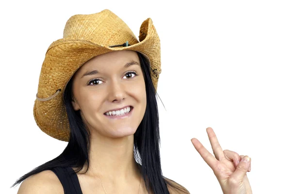 Pretty cowgirl making peace sign — Stock Photo, Image