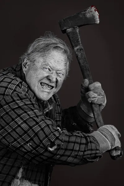 Crazy old man with axe — Stock Photo, Image