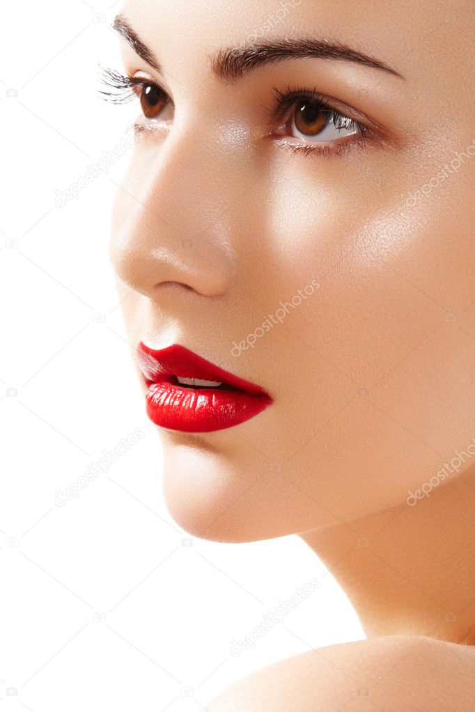Close-up portrait of beautiful woman. Purity face with bright red lips