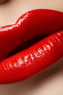 Close-up of woman's lips with bright fashion red makeup. Macro lips clipart