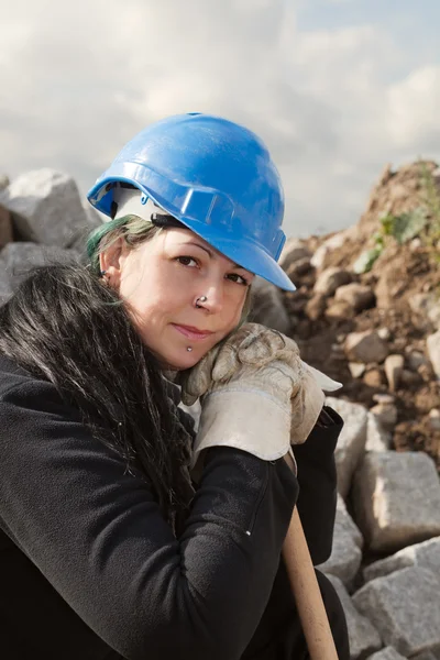Female worker in blue hardhat — Stock Photo, Image