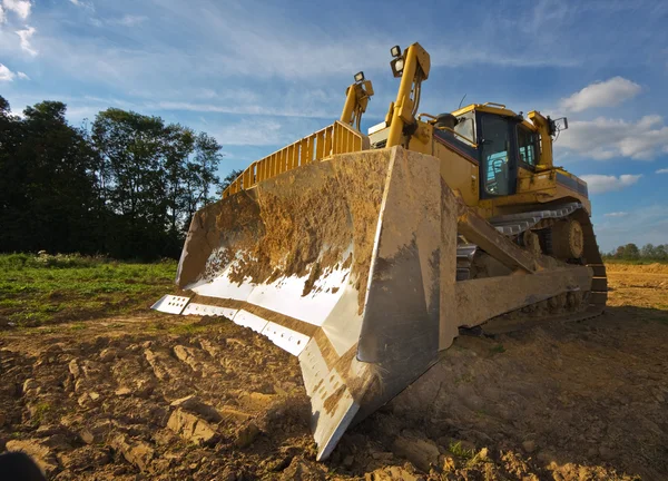 Smutsig gul bulldozer — Stockfoto