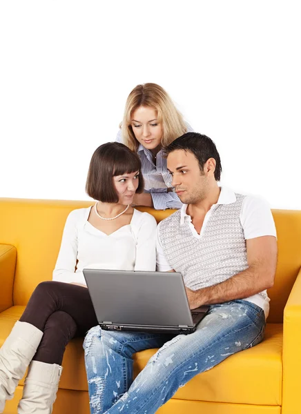 Three friends with laptop computer — Stock Photo, Image
