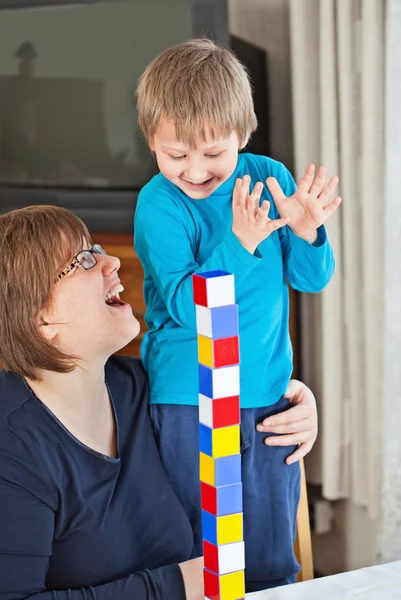 Mother and son playing together — Stock Photo, Image