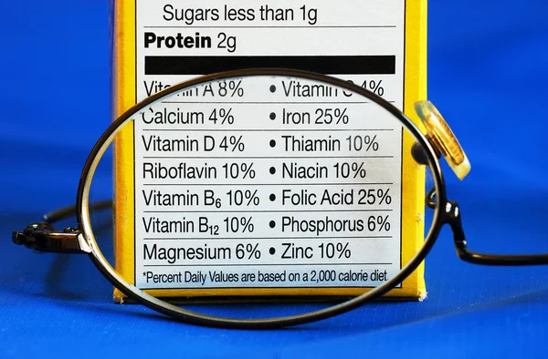 stock image Focus on the nutrition facts from a box of food concepts of eat healthy