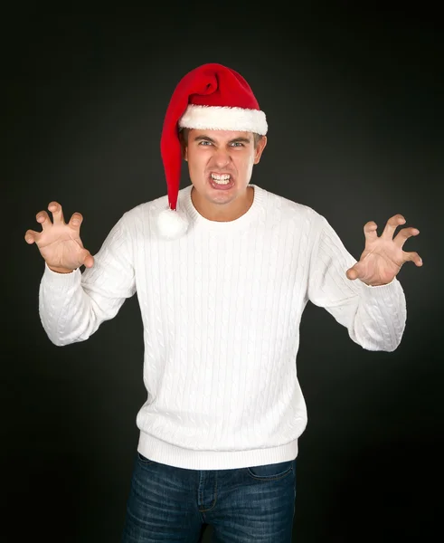 Mann im Gesicht des Weihnachtsmannes zeigt schreckliche — Stockfoto