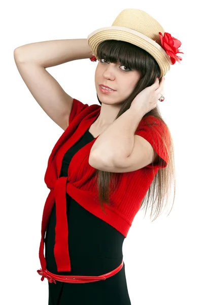 Portrait of brunette girl in a hat with a flower and a red sweat — Stock Photo, Image