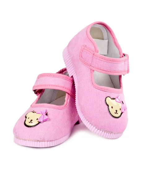 Пара дитячого рожевого взуття — стокове фото
