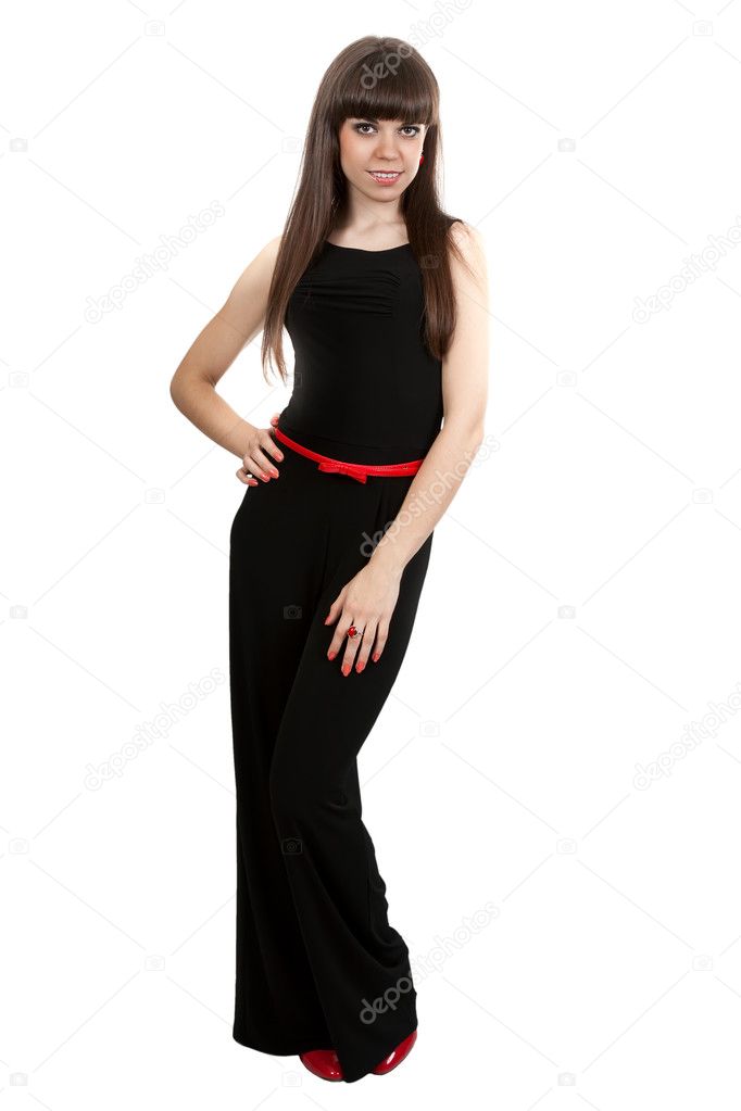Girl in black pants and red shoes in 