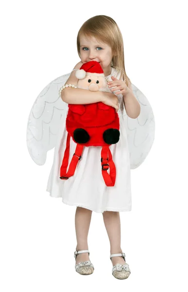 Meisje met engel vleugels en een rode santa claus — Stockfoto