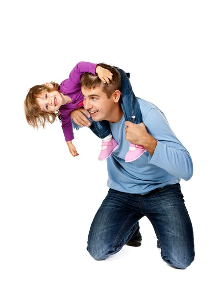 Happy father holding daughter on his shoulders — Stock Photo, Image