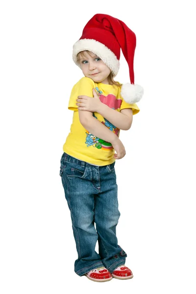 Klein meisje in Kerstman hoed op een witte achtergrond — Stockfoto