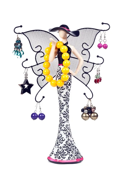 宝石で飾られたハングしている翼を持つ像女性 — ストック写真
