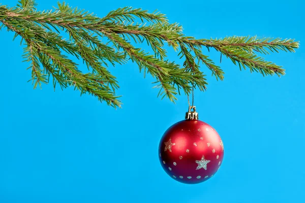 Fir branches and Christmas ball — Stock Photo, Image