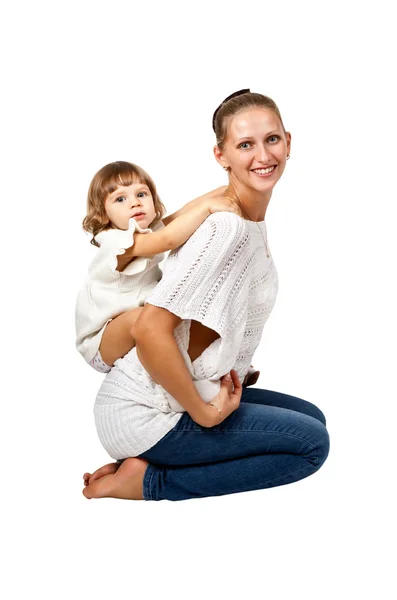 Mother and daughter sitting in the studio — Stock Photo, Image