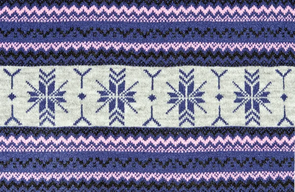 Knitted blue background with a pattern — Stock Photo, Image