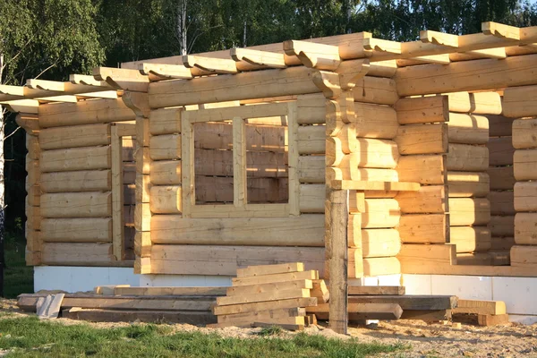 Stock image Wooden home under construction