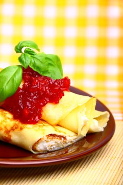 Sweet pancake with cottage cheese and cherry jam