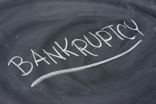 Bankruptcy word on blackboard — Stock Photo, Image