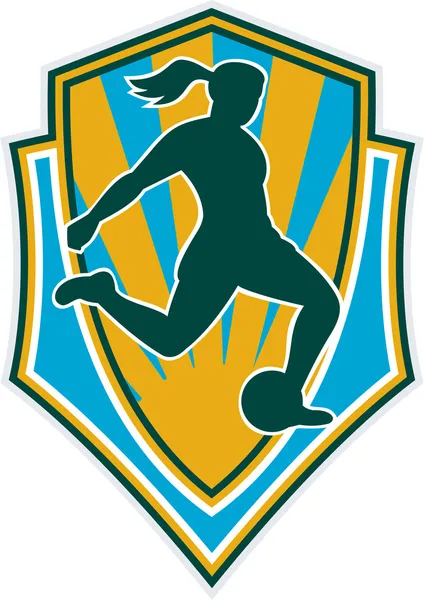 Soccer player woman kicking ball shield — Stock Photo, Image