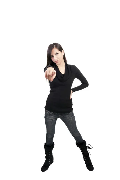Jovem caucasiano mulher apontando jeans botas camisola — Fotografia de Stock
