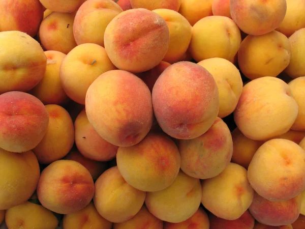 stock image Ripe peaches, laid out for sale