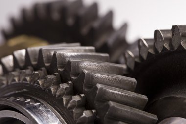 Gear wheels system over white background