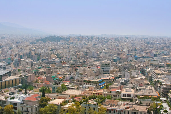 View from Acropolis of Athens, Greece. Beautiful panorama of capital with thousands of solar batteries on roofs.
