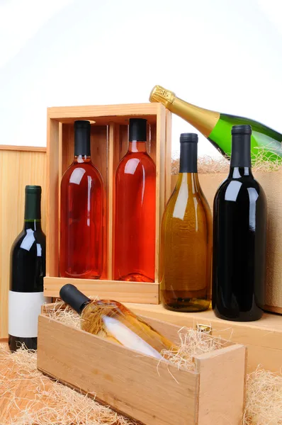 stock image Assortment of wine bottles on crates