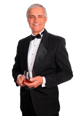 Man in Tuxedo with Congac Glass clipart