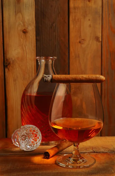 Cognac and decanter with cigar — Stock Photo, Image