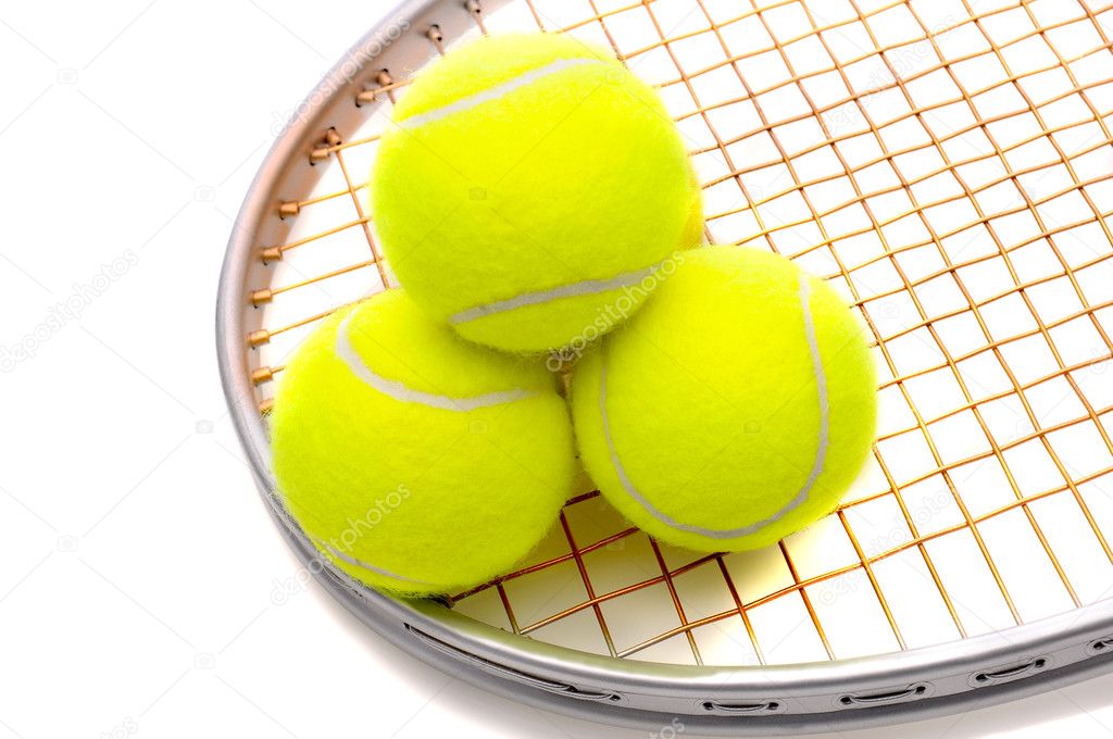 Tennis balls on racket