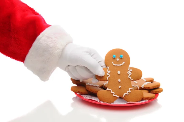 Santa Claus Taking Ginger Bread Man From Plate — Stock Photo, Image