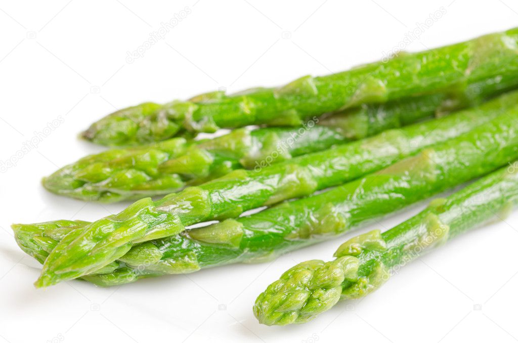 Fresh asparagus on white