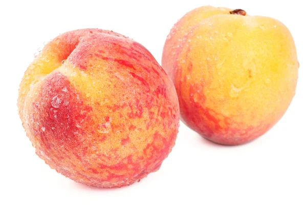 Two peaches on white — Stock Photo, Image