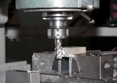 Drilling and milling CNC in workshop clipart