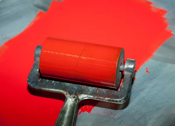 Τύπωμα με κυλίνδρους με κόκκινο μελάνι — Φωτογραφία Αρχείου